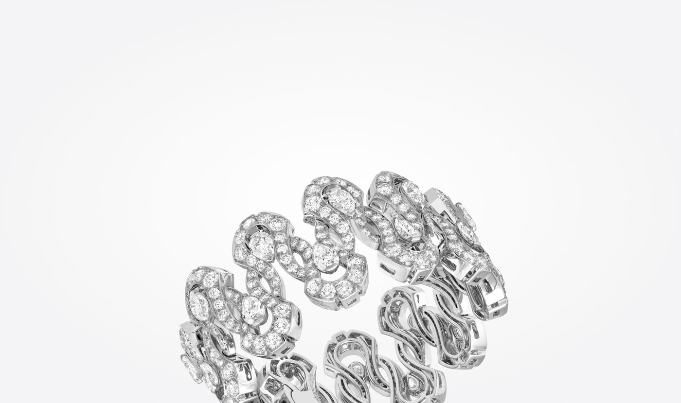 Boucles de diamants bracelet. White gold, diamonds. Legend of diamonds, White diamond variations collection, Van Cleef & Arpels. - Van Cleef & Arpels